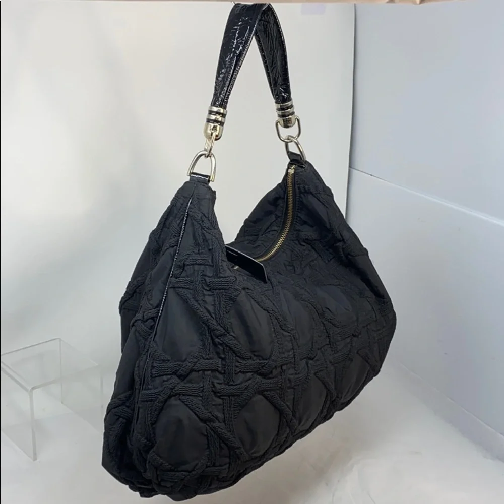Stuart WeitzmanBlack Quilted Fabric Hobo Bag